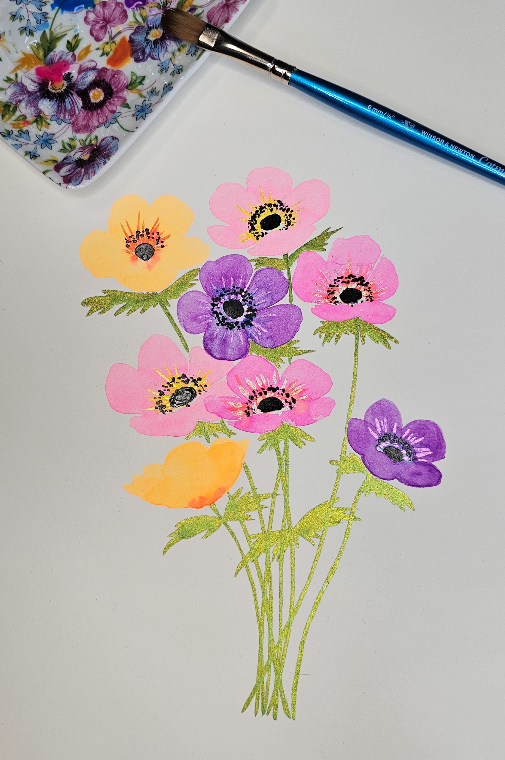 Aquarelle d’un bouquet d’anémones fluo aux teintes vibrantes, avec des tiges et des détails subtilement nacrés.
